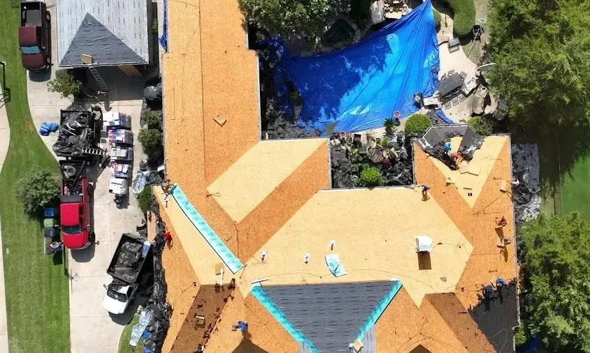 Professional Storm Damage Roof Repair being performed in Alamo